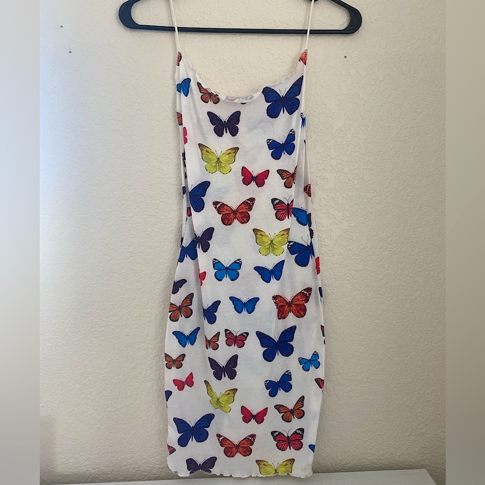 Cute Butterfly dress, short length and a size small💜🦋